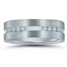 Custom quattro-inspired wedding band with diamonds